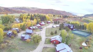 an aerial view of a village in the mountains at Homesteader in Clark