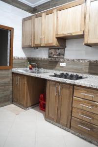 Kuchyň nebo kuchyňský kout v ubytování Apartamentos Azlabech 2