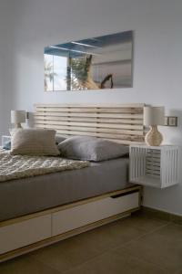 Ένα ή περισσότερα κρεβάτια σε δωμάτιο στο Apartment Casa Sol' Azahar, Panoramica Golf