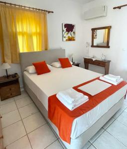 Posteľ alebo postele v izbe v ubytovaní Valentino Villas & Apartments