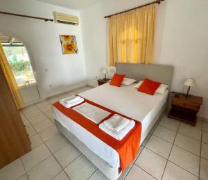 Posteľ alebo postele v izbe v ubytovaní Valentino Villas & Apartments