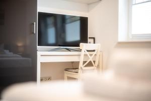 TV a/nebo společenská místnost v ubytování Ferienhaus Seele an der Müritz