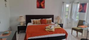 Letto o letti in una camera di Tropical Harbour View