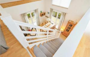 an overhead view of a staircase in a house at Seebrise in Süssau +8 photos