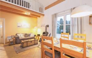 a living room with a couch and a table at Seebrise in Süssau