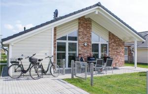 two bikes parked in front of a building at Gorgeous Home In Dagebüll With Sauna in Dagebüll
