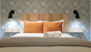 Una cama o camas en una habitación de Casa La Costa By Wynwood House