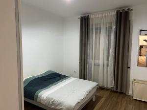 Postel nebo postele na pokoji v ubytování Zahra