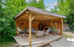 Zahrada ubytování Nice Home In Aakirkeby With Sauna + 32 fotografií