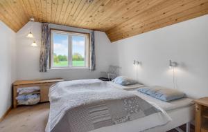 Ένα ή περισσότερα κρεβάτια σε δωμάτιο στο Holiday Home Østerskovvej Humble Iv +8 φωτογραφίες