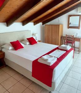 Posteľ alebo postele v izbe v ubytovaní Valentino Villas & Apartments