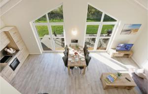 an overhead view of a living room with a table and chairs at Stunning Home In Dagebüll With Sauna in Dagebüll