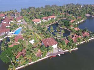 an aerial view of a resort in the water at Club Mahindra Cherai Beach in Cherai Beach