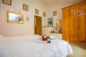 Posteľ alebo postele v izbe v ubytovaní Residence Christina Due Laghi - Happy Rentals