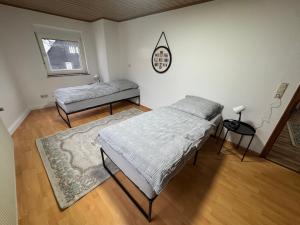 Postel nebo postele na pokoji v ubytování Schelder Gästezimmer