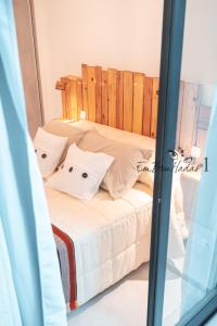 Postel nebo postele na pokoji v ubytování EmBruHadas Yellow