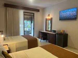 Voodi või voodid majutusasutuse Xuux Peek by Tecnohotel toas