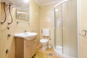 Kúpeľňa v ubytovaní Imperium Apartments + 37 fotografií