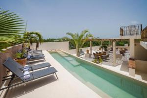 Bazén v ubytování Koos Tulum Hotel nebo v jeho okolí
