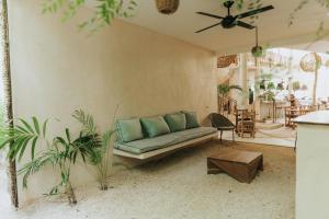 Χώρος καθιστικού στο Koos Tulum Hotel