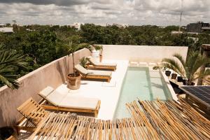 Πισίνα στο ή κοντά στο Koos Tulum Hotel