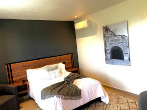 Postel nebo postele na pokoji v ubytování HOTEL MINA REAL MATEHUALA