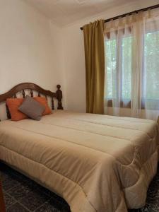 Postel nebo postele na pokoji v ubytování Rancho Cukamonga Lodge + 27 fotografií