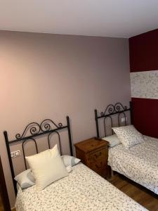 A bed or beds in a room at El Molin de Eloy