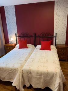 A bed or beds in a room at El Molin de Eloy