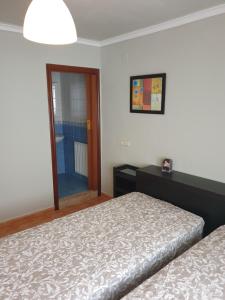 A bed or beds in a room at El Molin de Eloy