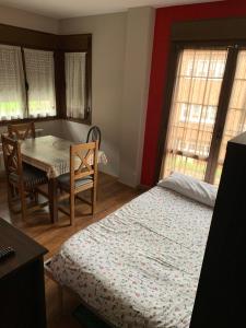 A bed or beds in a room at El Molin de Eloy