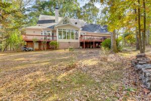 a large house with a large yard at Lakefront Hartwell Retreat with Gas Grill and Deck! in Hartwell