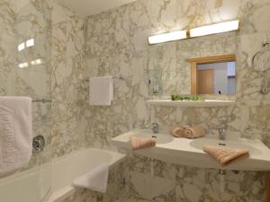 Kúpeľňa v ubytovaní Alpenhotel Kramerwirt