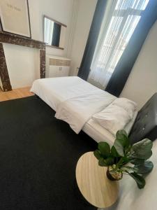 Rúm í herbergi á Coliving - sharing space EU