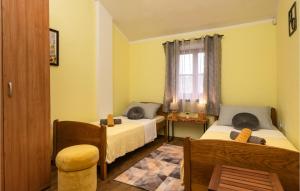 Postel nebo postele na pokoji v ubytování Holiday Home Dalmatinska Croatia