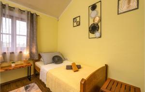 Postel nebo postele na pokoji v ubytování Holiday Home Dalmatinska Croatia