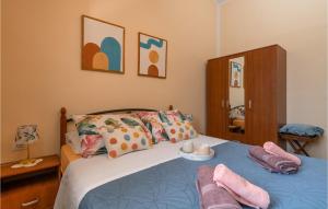 Postel nebo postele na pokoji v ubytování Holiday Home Dalmatinska Croatia