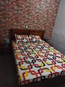 Ένα ή περισσότερα κρεβάτια σε δωμάτιο στο Résidence Daniel