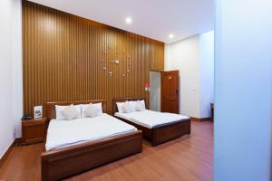 Postel nebo postele na pokoji v ubytování Nguyên Thái + 11 fotografií