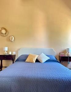 Postel nebo postele na pokoji v ubytování Locanda Val d'Orcia