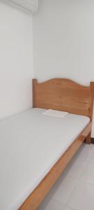 Ένα ή περισσότερα κρεβάτια σε δωμάτιο στο MJ's Guesthouse