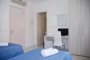 Postel nebo postele na pokoji v ubytování B&B Sikelia