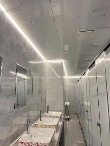 Koupelna v ubytování Zhihexing Youth Hostel-知和行青年酒店