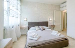 A bed or beds in a room at Villa Cristina
