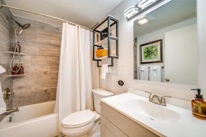 a bathroom with a sink and a toilet and a tub at Walk to Liberty Mountain Lake-View Ski Retreat! in Fairfield +21 photos
