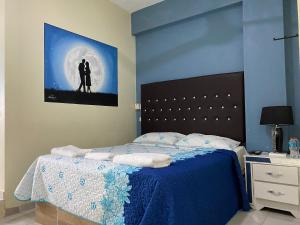 Postel nebo postele na pokoji v ubytování Hotel El Parque Constanza + 4 fotografie