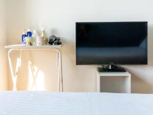 TV a/nebo společenská místnost v ubytování BlueRock