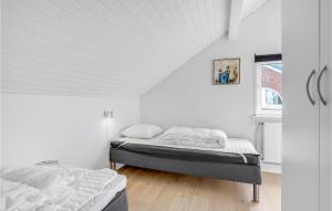 Nice Home In Rømø With Wifi客房内的一张或多张床位