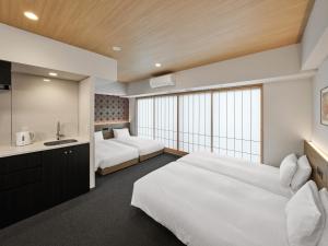 MIMARU Tokyo Kinshicho房間的床
