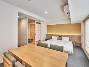 MIMARU Tokyo Kinshicho房間的床